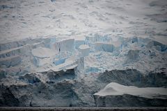 01C Massive Broken Ice Seracs Tumbling Down To The Water From Zodiac Near Danco Island On Quark Expeditions Antarctica Cruise
